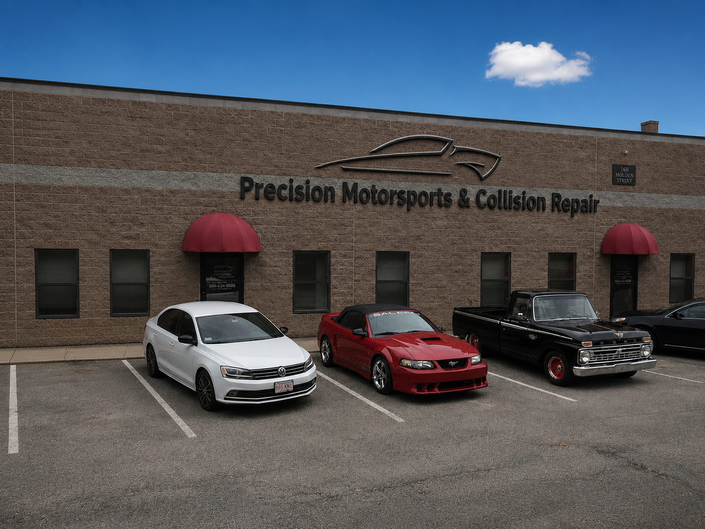 Restoration shop with race cars